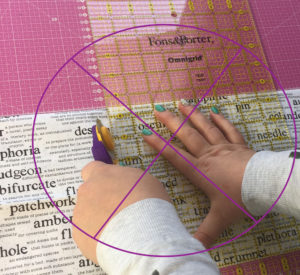 Attempting to cut some fabric using my left hand.