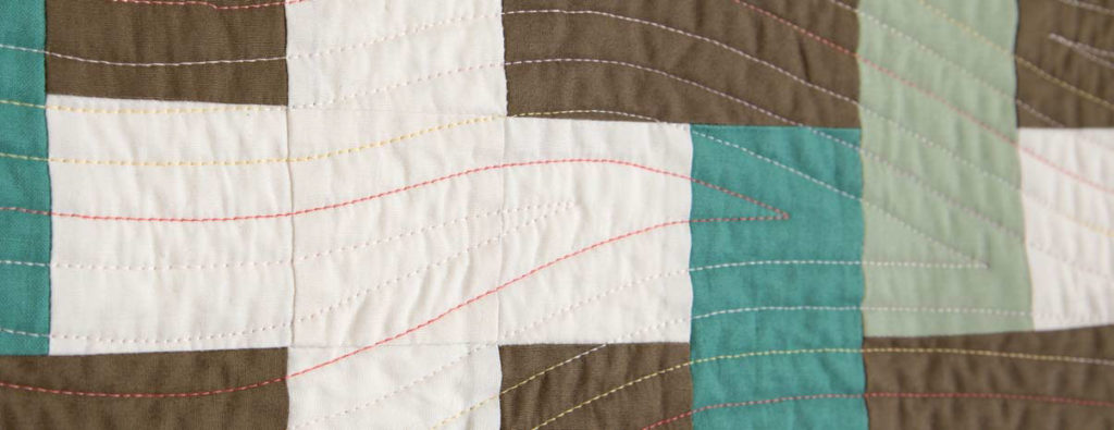 Detail of "Mediterranean Breezes" designed and walking foot quilted by Catherine Redford.