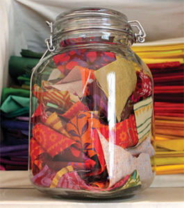 Jar of scrap fabric in Vivika's studio.