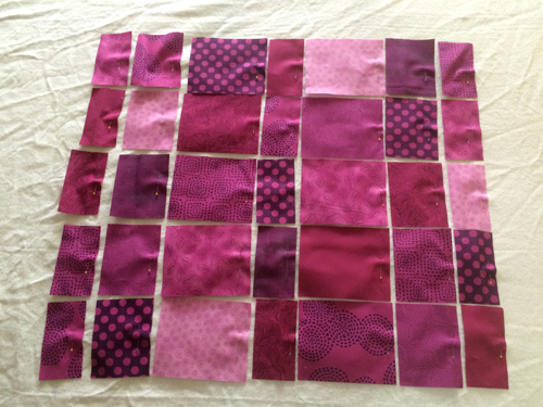 Auditioning patches in every value of red-violet Patches laid out 500px That Cat: A Visit with Pam Lincoln